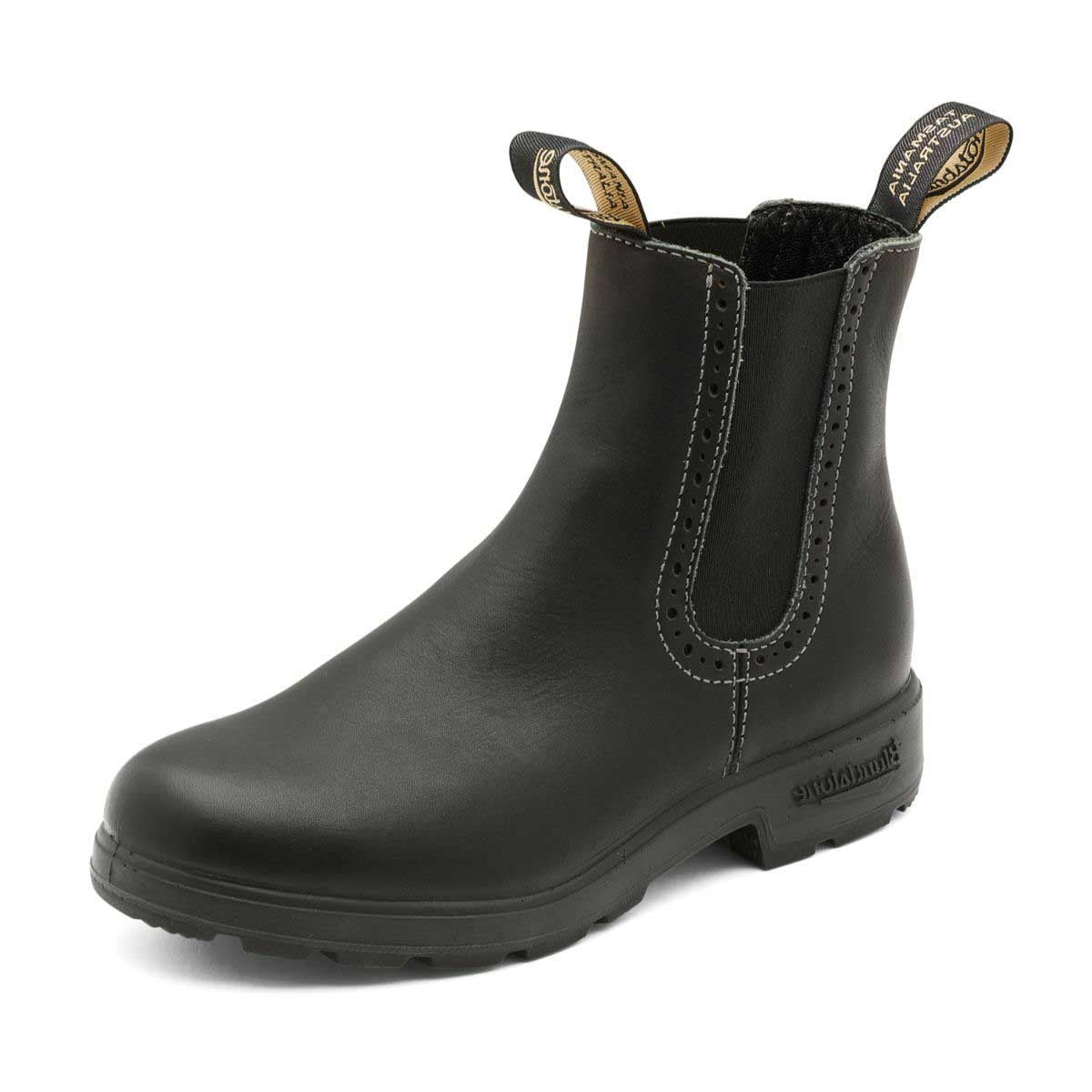 Women's high top blundstone boot in black, with eyelet detail around elastic, front view.