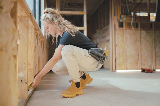 Blundstone XFR CSA boots in wheat, worn on a building site.