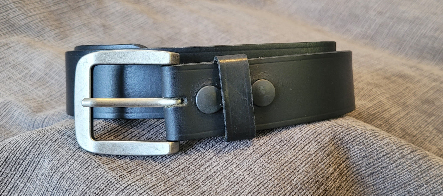 Black leather belt with silver buckle 