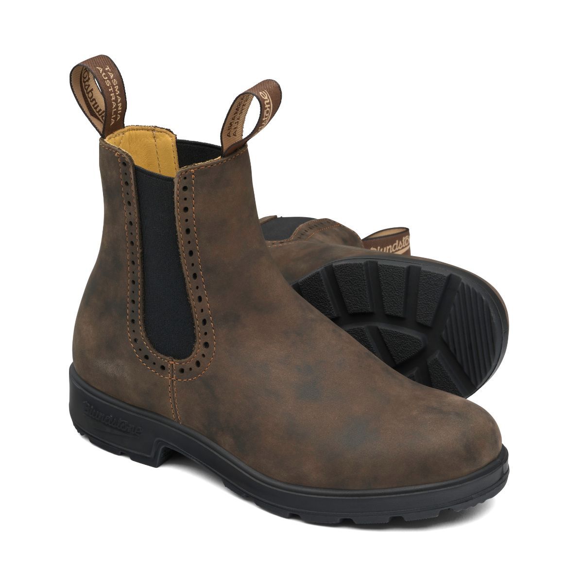 High top rustic brown blundstone boots with eyelet detail around black elastic.