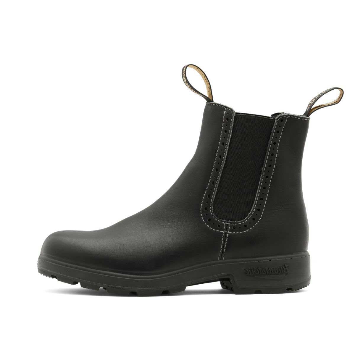 Women's high top blundstone boot in black, with eyelet detail around elastic, interior side view.
